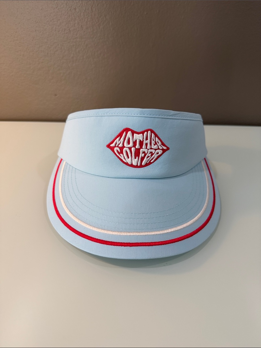 G/FORE Adult Light Blue Visor with Red Lip Logo